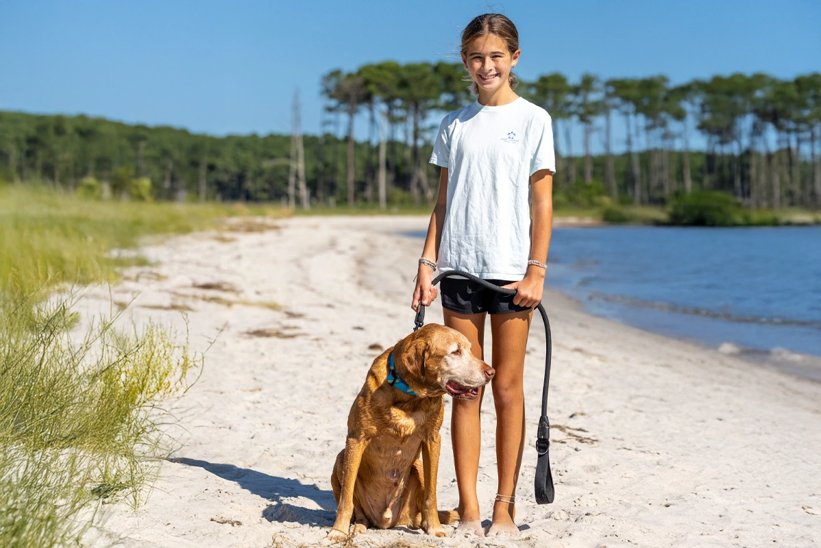 Family photographer Lewes DE capturing natural coastal portraits by Fox Red Foto